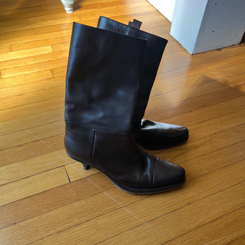 Dark Brown Prada Boots. Size 40 and fit my size 10 foot never worn. Kitten heels